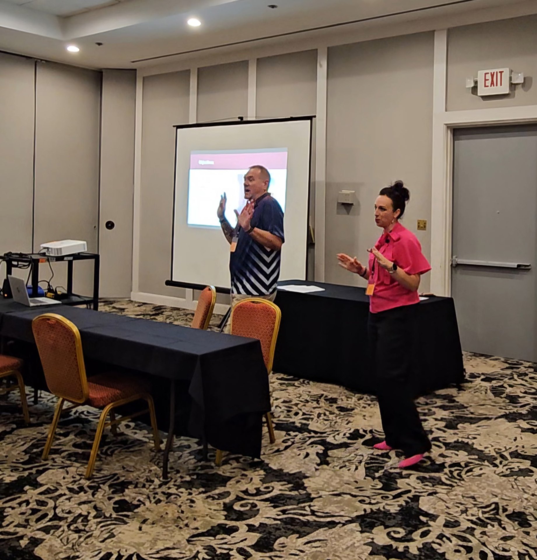 Paul and Heather speaking to first responders at a department training